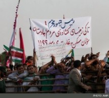 اعتراض شدید مردم حویزه به مصادره زمینهایشان، در سفر احمدی نژاد به این شهر
